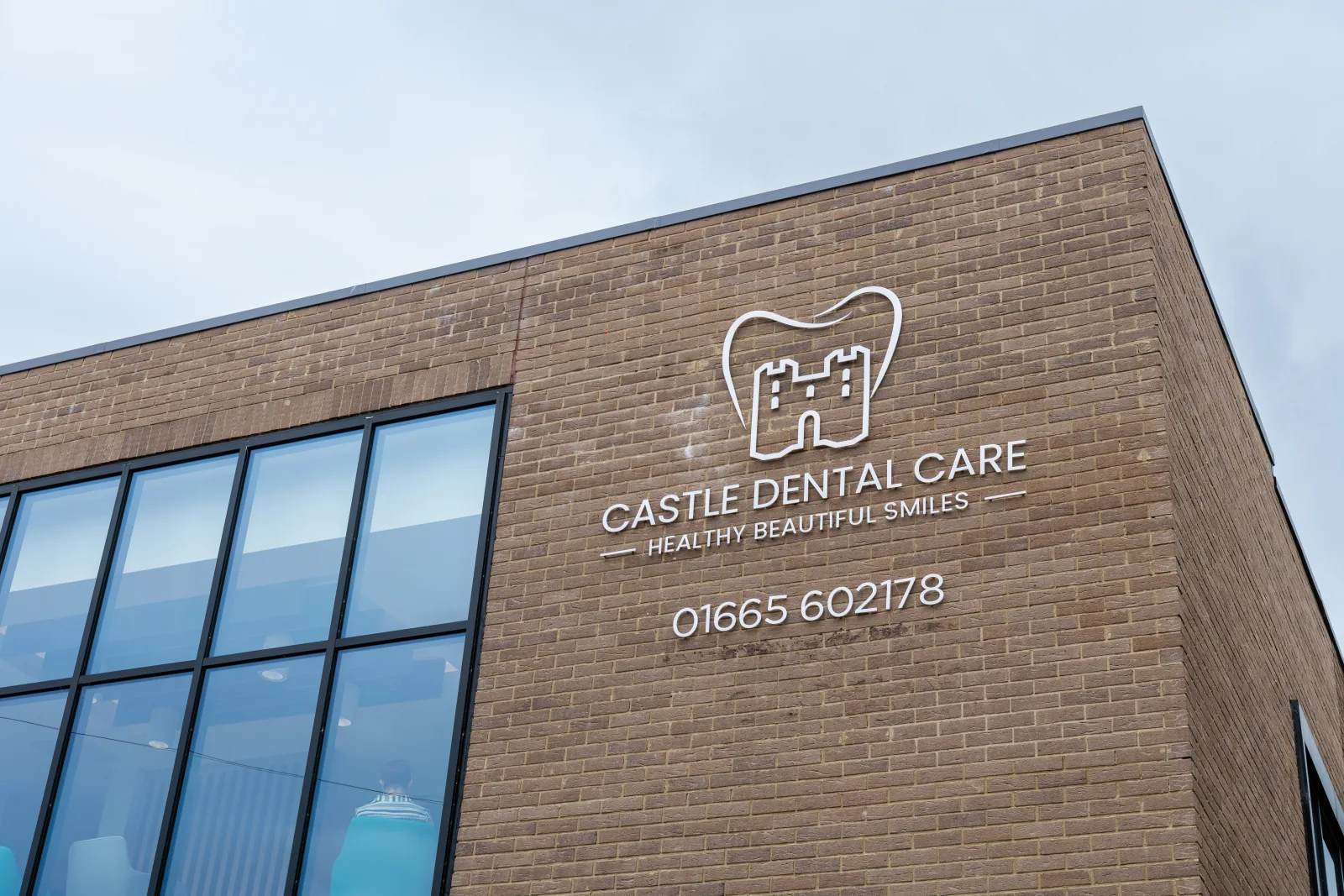 Wall sign for Castle Dental Care