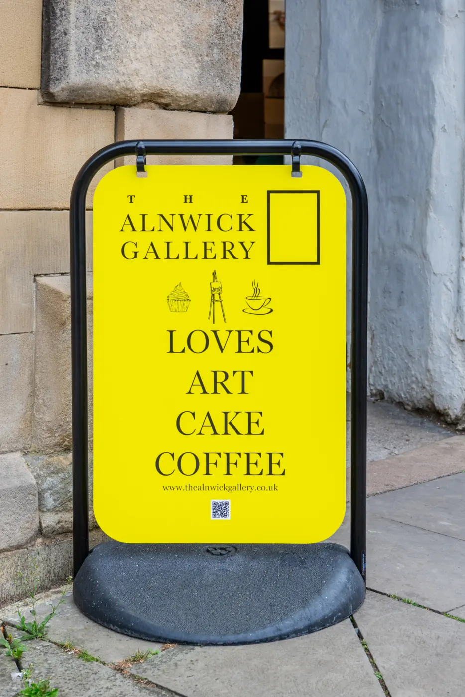 Yellow swinger pavement sign for Alnwick Gallery