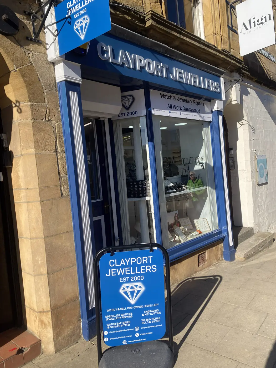 Clayport Jewellers shop front with a matching A-board