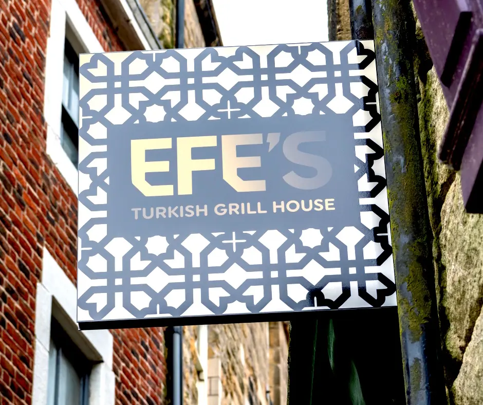 Patterned projecting sign for Efe's Turkish Grill House